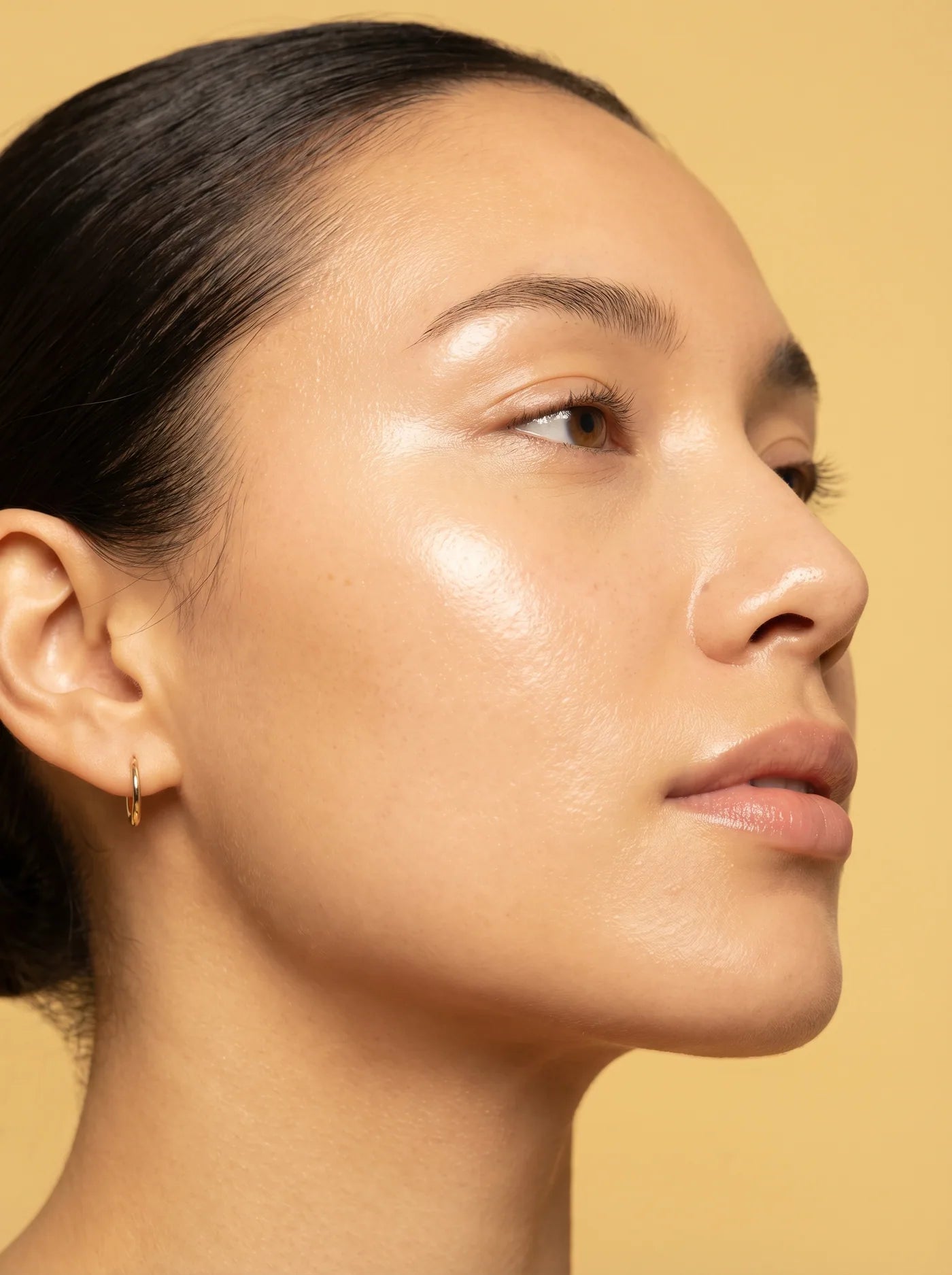 After gua sha ritual — sculpted, glowing skin